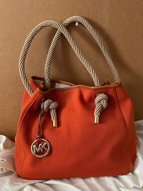 Michael Kors Orange Canvas Tote with Rope Handles and MK Charm